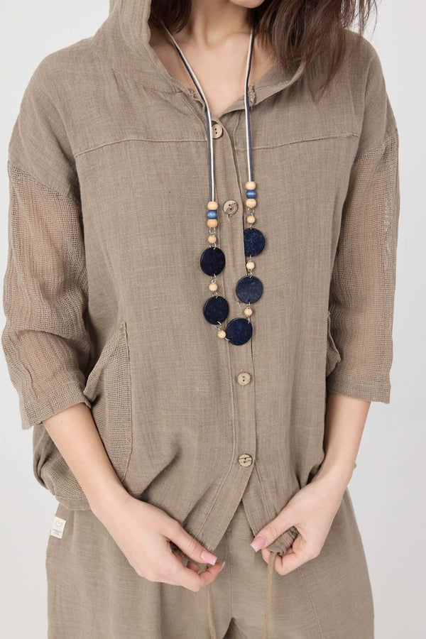 Dune Pamuk Hoodie in brown with tulle details, perfect for summer, featuring a snug fit and accessorized with a beaded necklace.