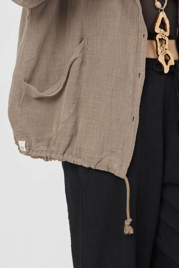 Dune Pamuk Hoodie in brown with textured fabric, featuring a hood and pockets, perfect for summer wear.