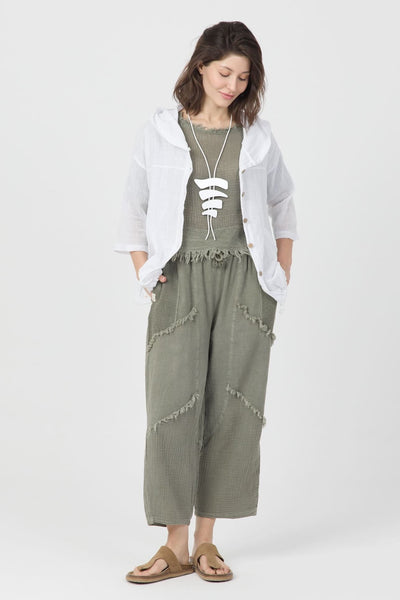 Sage Echo Pantolon in sage green, featuring raw hem details, paired with a white lightweight jacket and boho accessories.