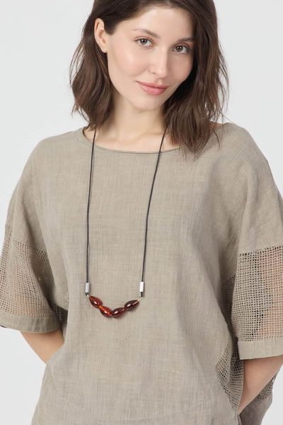 Dune File Kol Bluz features a relaxed fit with mesh detail, perfect for summer styling in organic cotton.